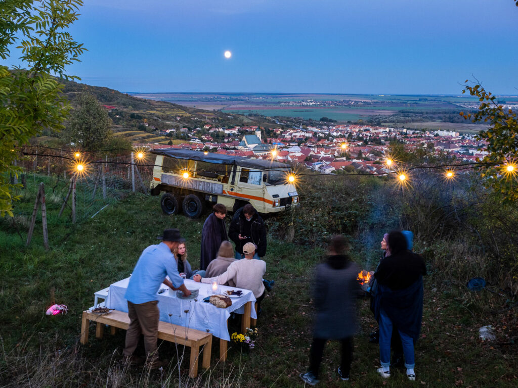 WINESAFARI Svaty Jur Slovakia local glass of wine tasting attraction the best guided tour outdoor fun Pinzgauer new experience vineyards in Bratislava area close to Vienna Austria in Central Europe dinner in the vineyards ambient light sunsent and moonlight together