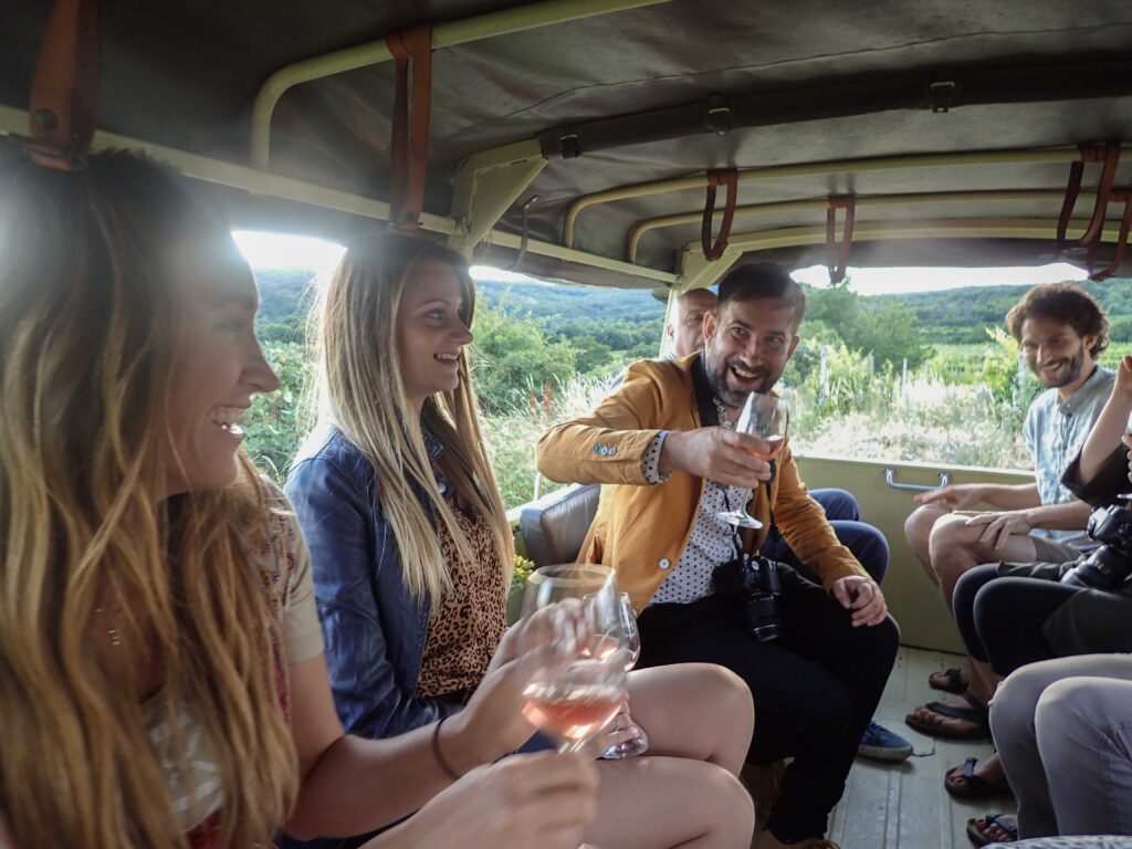 WINESAFARI Svaty Jur Slovakia local glass of wine tasting attraction the best guided tour outdoor fun Pinzgauer new experience vineyards in Bratislava area close to Vienna Austria in Central Europe drinking wine in the car